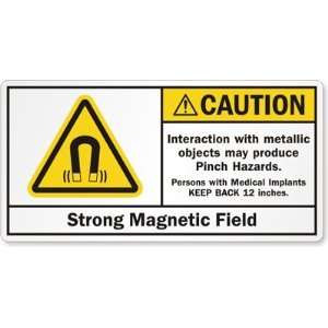 Strong Magnetic Field. Interaction with metallic objects may produce 