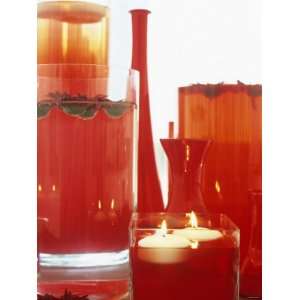  Red Vases and Floating Candles as Party Decorations 