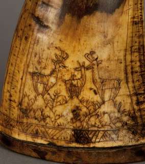 engraved powder horn 18th century with hunting scenes  