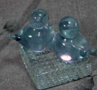 Vintage glass paperweight in the shape of a pair of birds on a square 