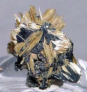   ) shoots from a rich metallic Hematite center. Origin is Brazil