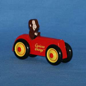 Vintage Curious George George in a Wooden Derby Car by Schylling 