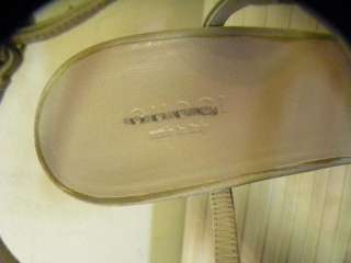 of shoes at toes have discoloring bottom soles have wear with scuffing 