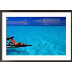  Woman Basking in the Sun on an Outrigger Boat in an Island 