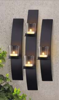 This set of 3 of black metal and glass wall mount tea light holders 