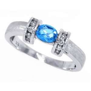  0.31Ct Oval Blue Topaz Ring with Diamonds in 14Kt Satin 