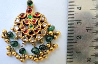 Antique gold kundan pendant with diamond rubies emerald  