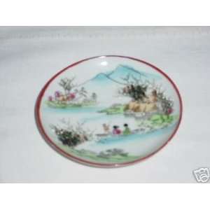   Vintage Porcelain Oriental Scene Saucers from Japan 