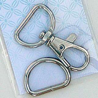 Nickel  1 swivel clasp and D ring. Size 3/4 inside width measurement.