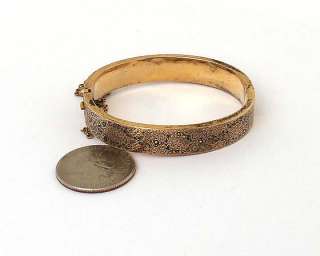   victorian 18k gold engraved enameled bangle bracelet the piece is
