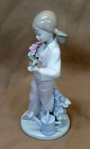 LLADRO SPRING GIRL WITH FLOWERS AND PIGTAILS # 5217 RETIRED  