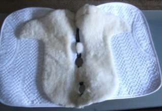   quilt with half lined genuine sheepskin plus heat vents along spine