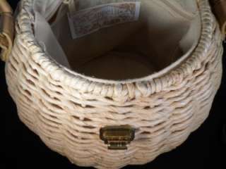 Offered is a great Cappelli straw bag with a lavish assortment of 