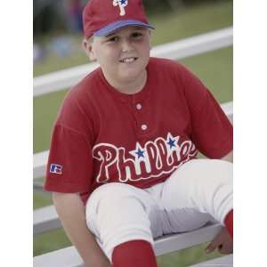   Boy Sitting in a Baseball Uniform Giclee Poster Print