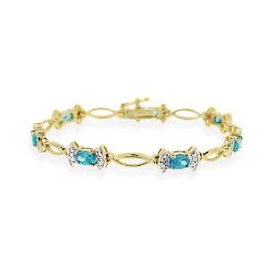   Gold Over Sterling Silver Light Blue CZ & Diamond Accent Bow Bracelet