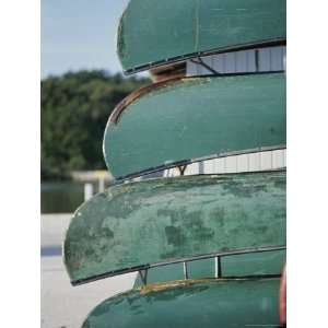  Canoes Await Adventurers on a Dock in the Everglades 