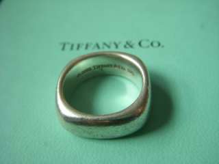 This stunning cushion ring is fully hallmarkedcopyright symbol 2003 