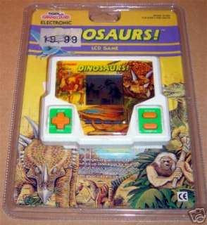 TIGER ELECTRONIC HANDHELD DINOSAURS LCD TOY GAME NEW  