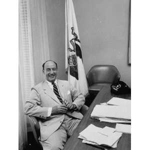  Adlai E. Stevenson Seated Behind Desk in Office, Smiling 