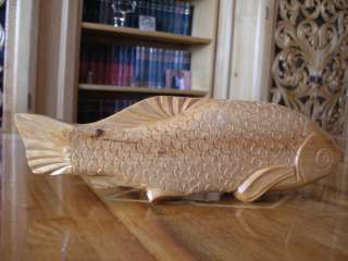 This is an authentic one of kind hand carved wood sculpture in 